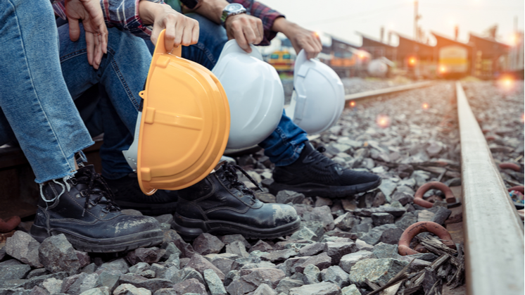 hard-hats-train-tracks-749x416.png